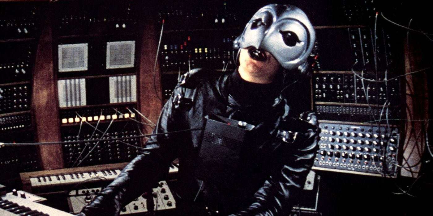 The  Phantom (William Finley) plays music in room filled with soundboards in Phantom of the Paradise.