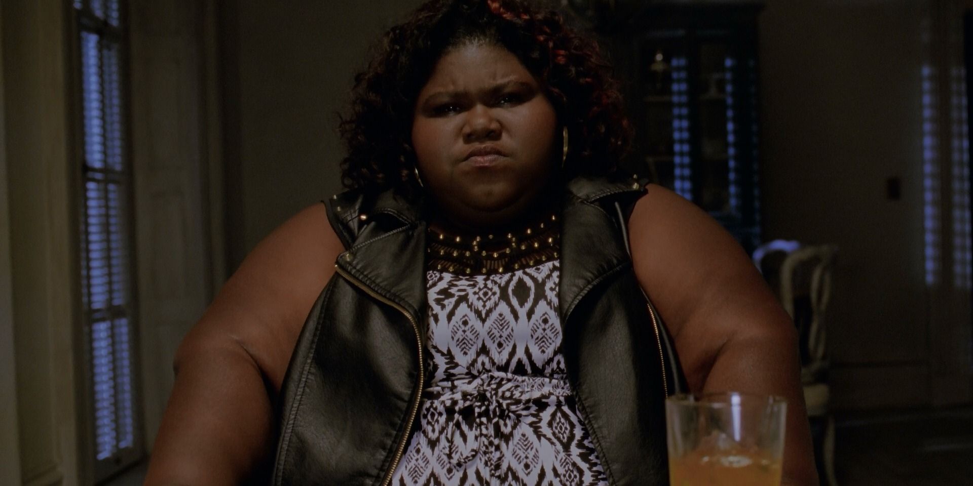 Queenie at the dinner table in AHS Coven
