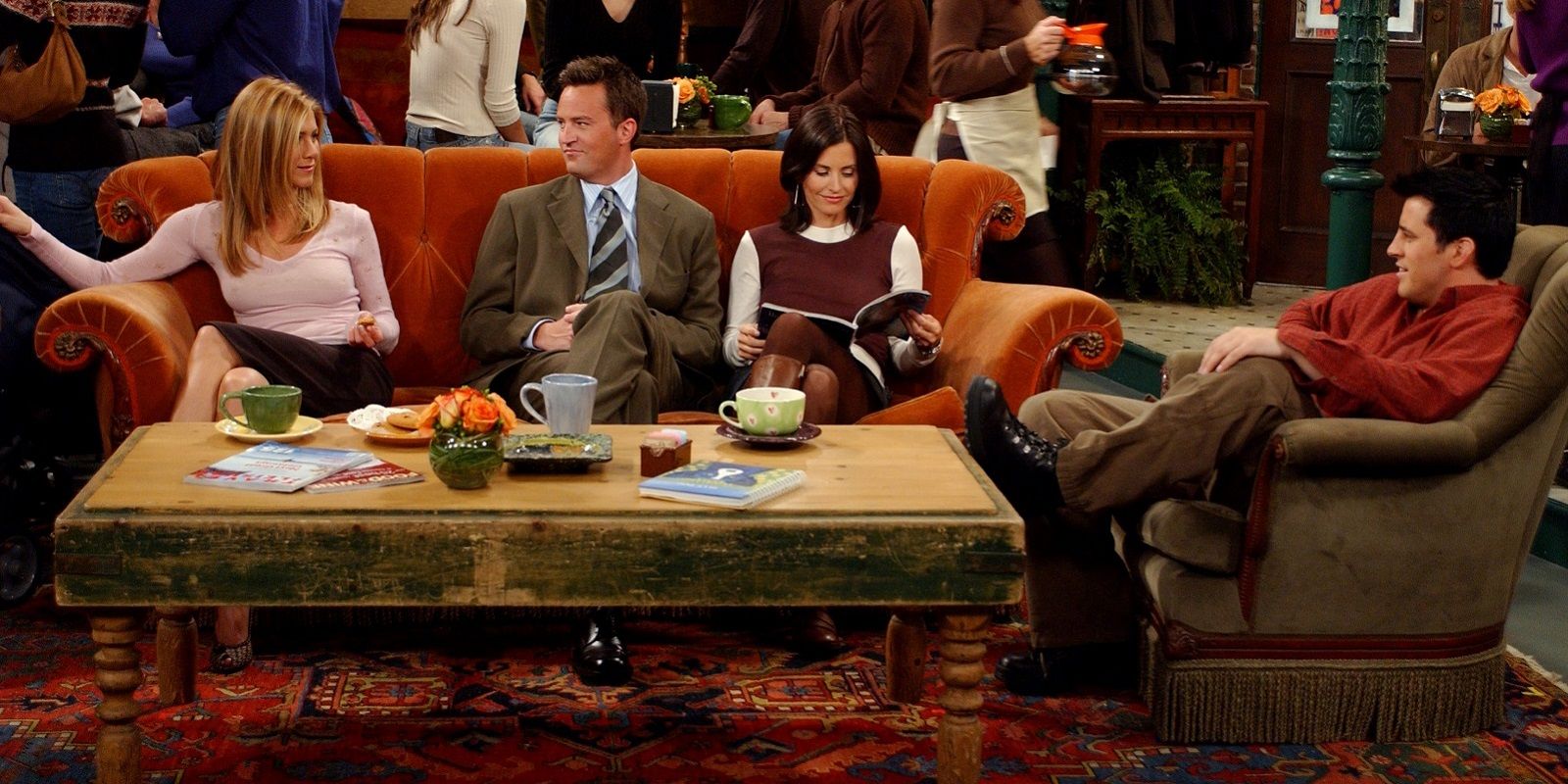 The cast of Friends sitting on couches