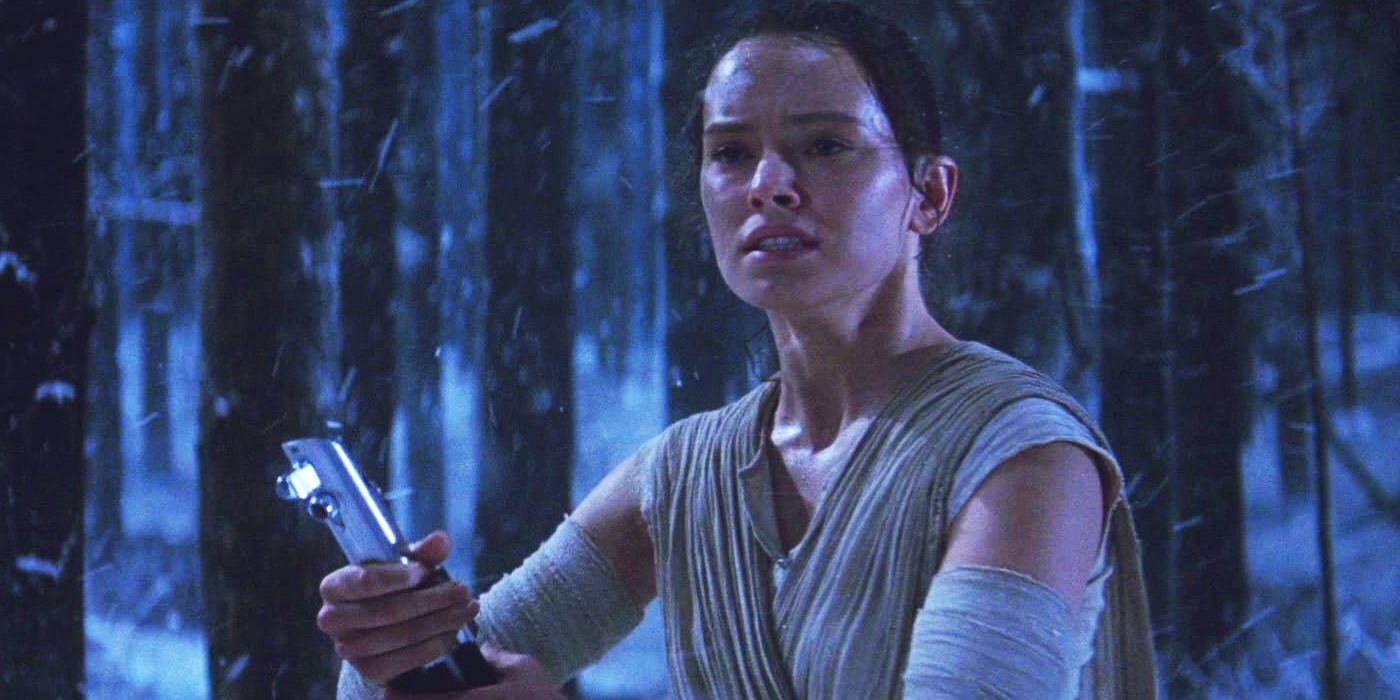 Rey getting the Skywalker lightsaber in The Force Awakens