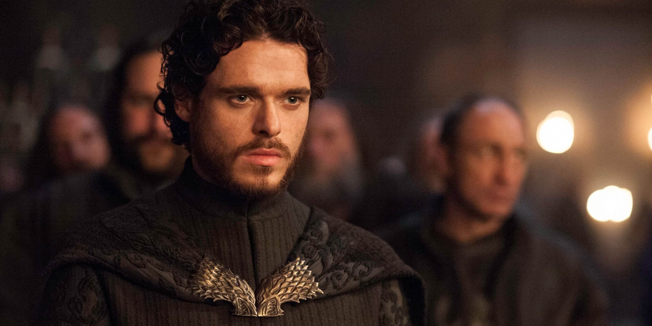Robb Stark with his bannermen behind him in Game of Thrones.