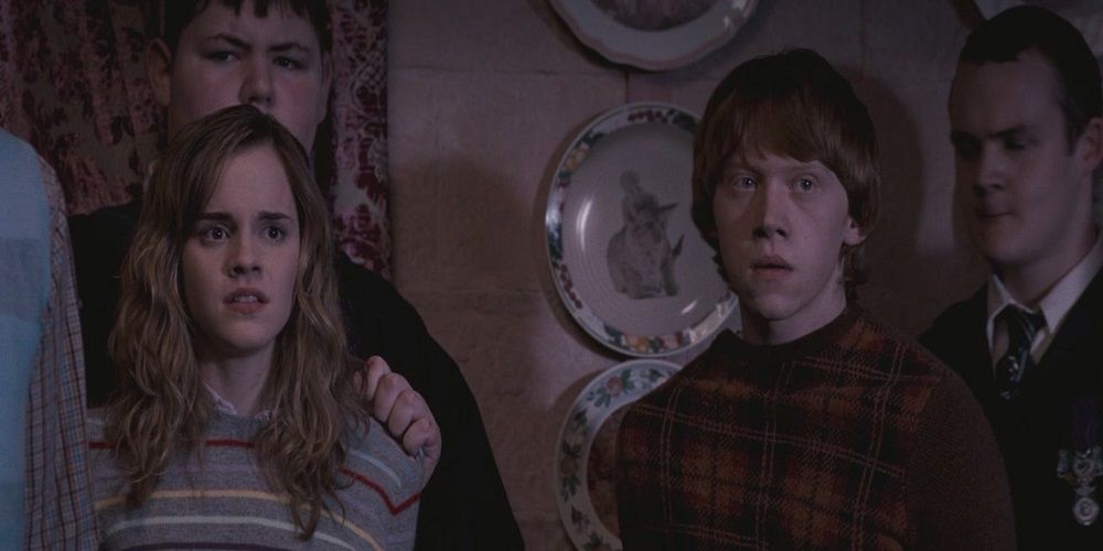 Ron and Hermione held by Crebbe and Goylle