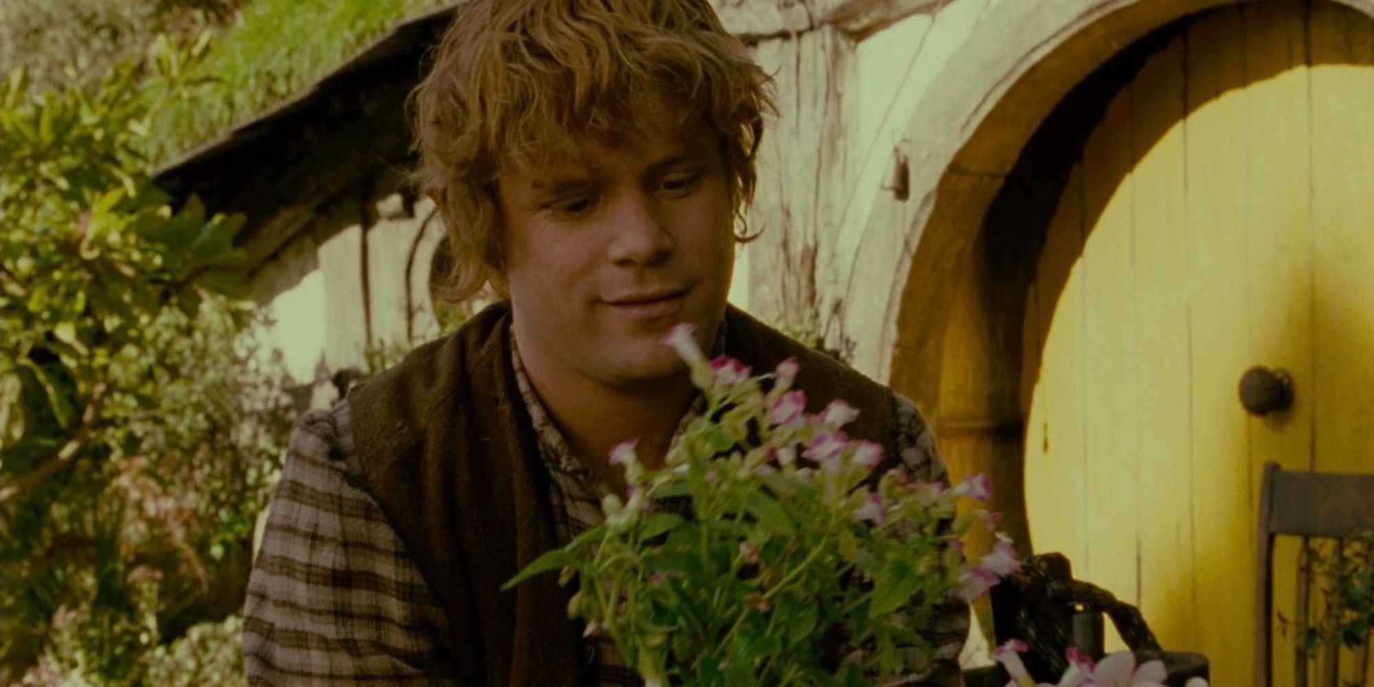 Sam planting flowers in The Lord of the Rings The Fellowship of the Ring