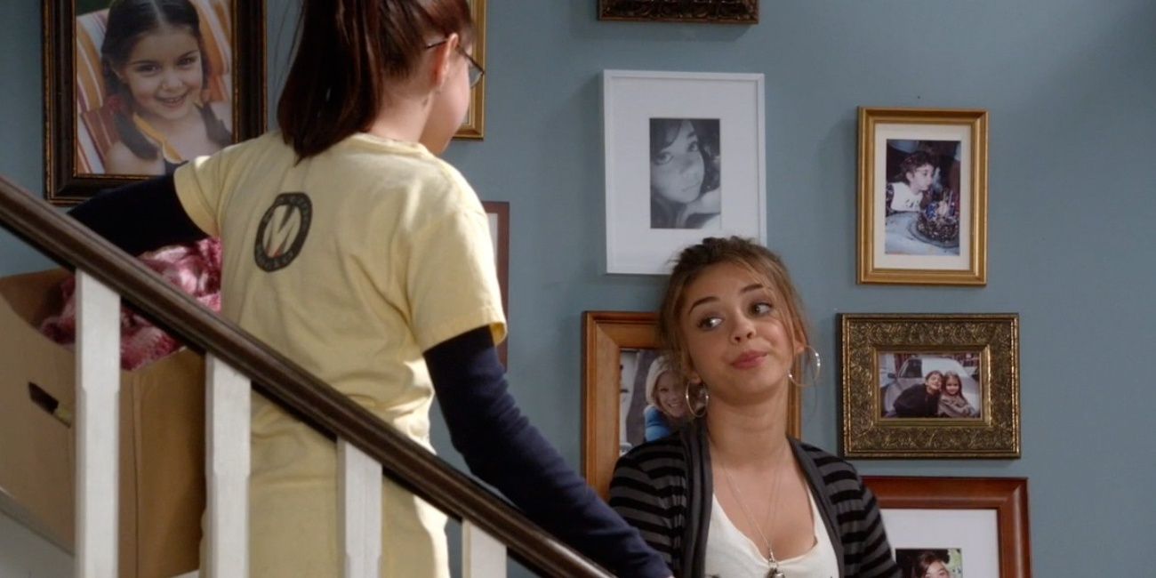 Haley and Alex talking in the stairs of their house