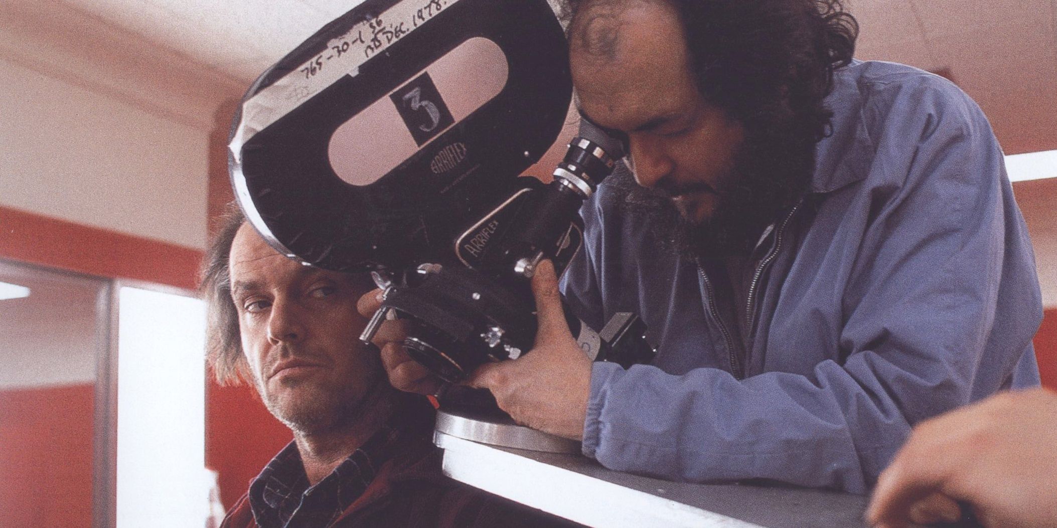 Stanley Kubrick filming a scene from The Shining next to Jack Nicholson
