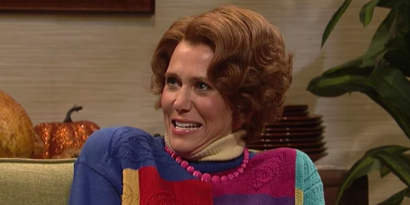 Kristen Wiig on SNL playing Sue, wearing a sweater and a wig