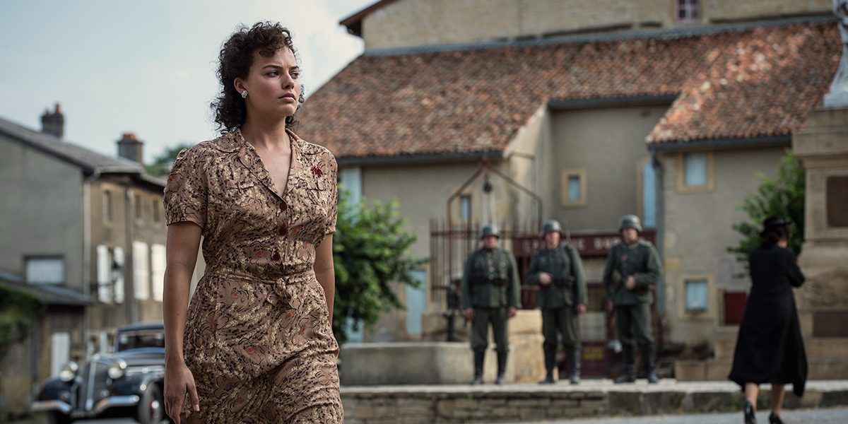 Margot Robbie with brown curly hair for her role in Suite Francaise