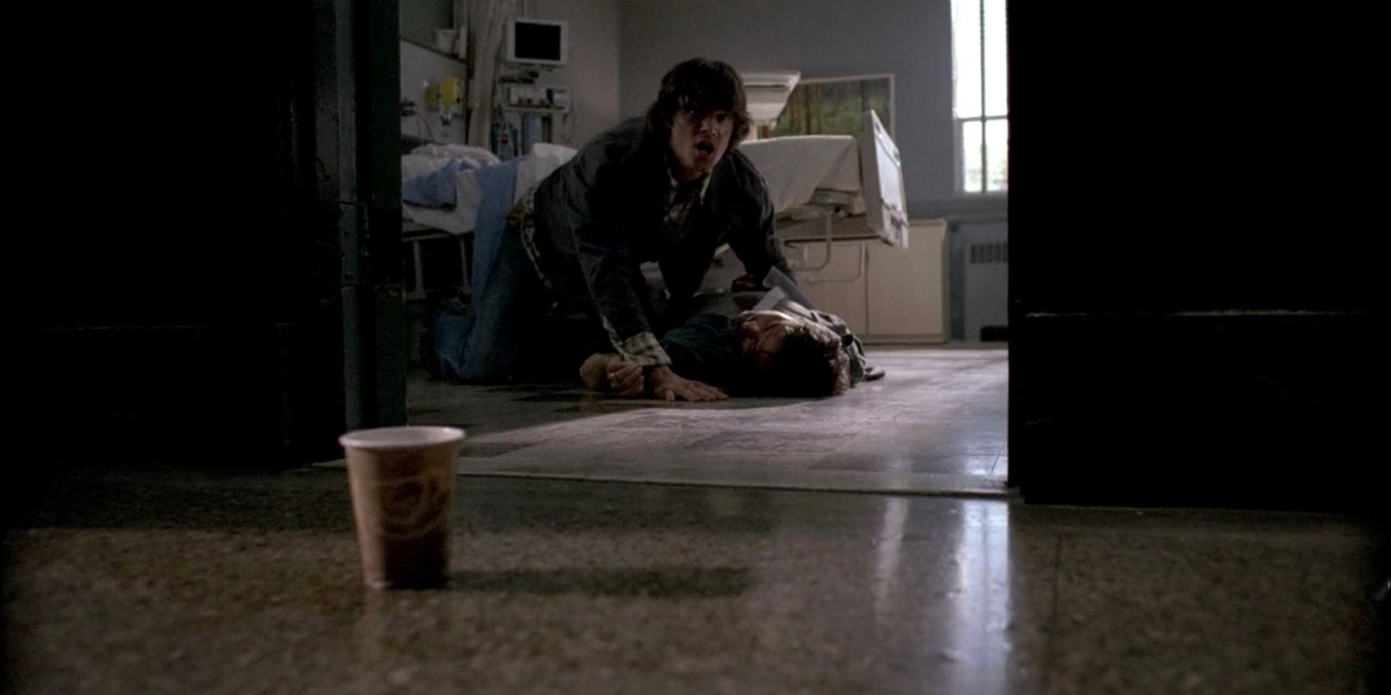 Sam finds John dead in the hospital after he made a deal with Azazel to save Deans life in Supernatural