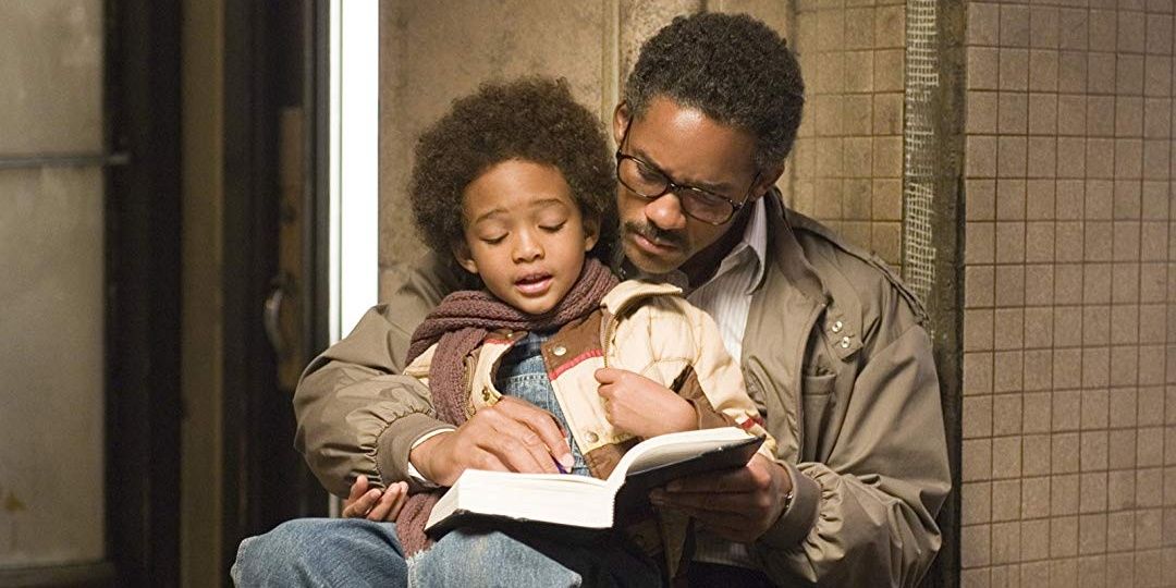 Will Smith and Jaden Smith reading a book together in the pursuit of happyness