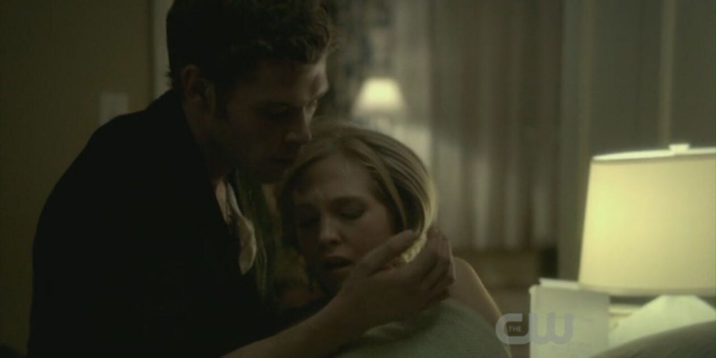 Klaus feeds Caroline his blood