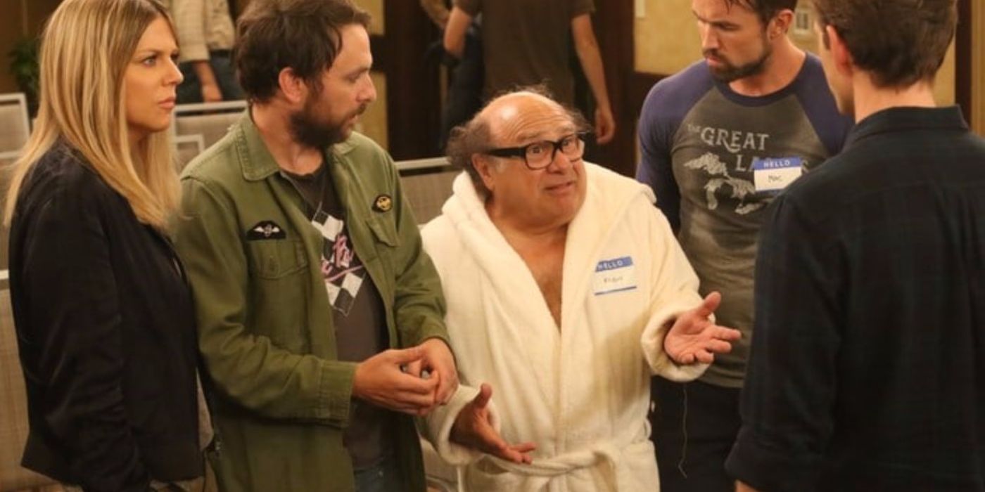 Frank in a bath robe talking to the gang in It's Always Sunny in Philadelphia