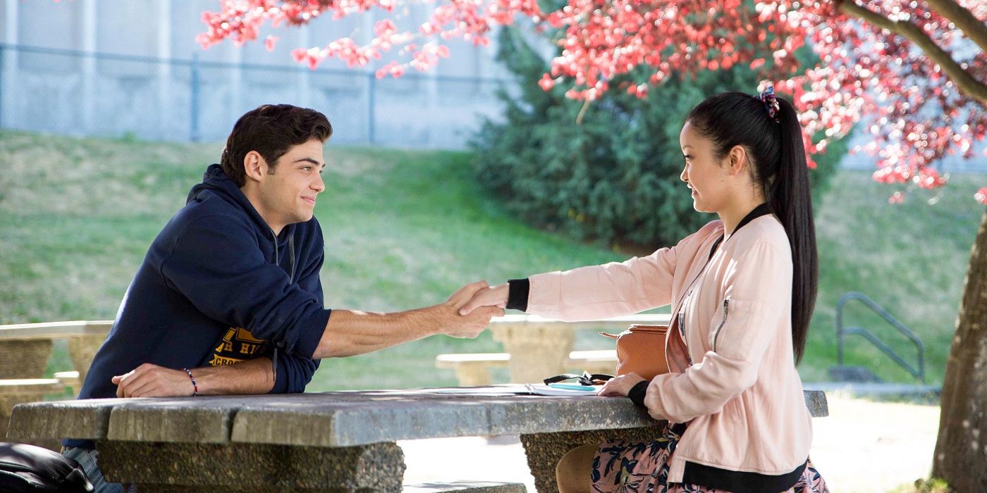 Peter and Lara Jean shake hands in To All The Boys I've Loved Before