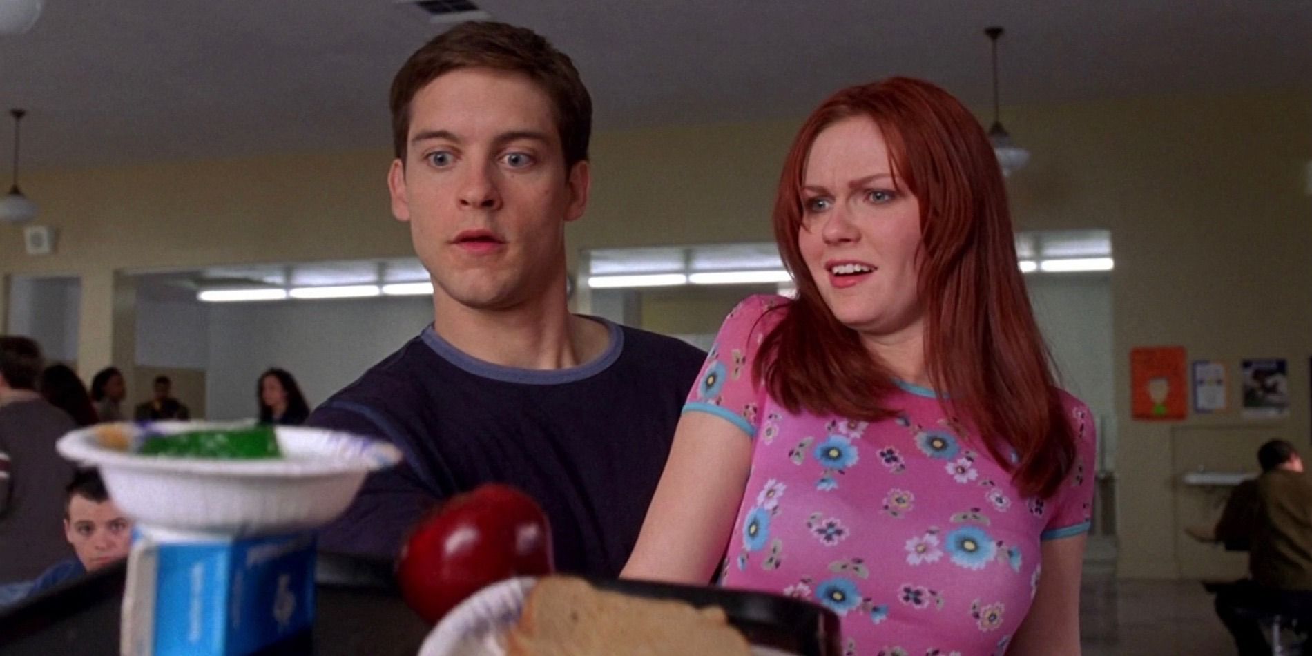 Tobey Maguire como Peter Parker e Kirsten Dunst como Mary Jane Watson em Homem-Aranha 2002