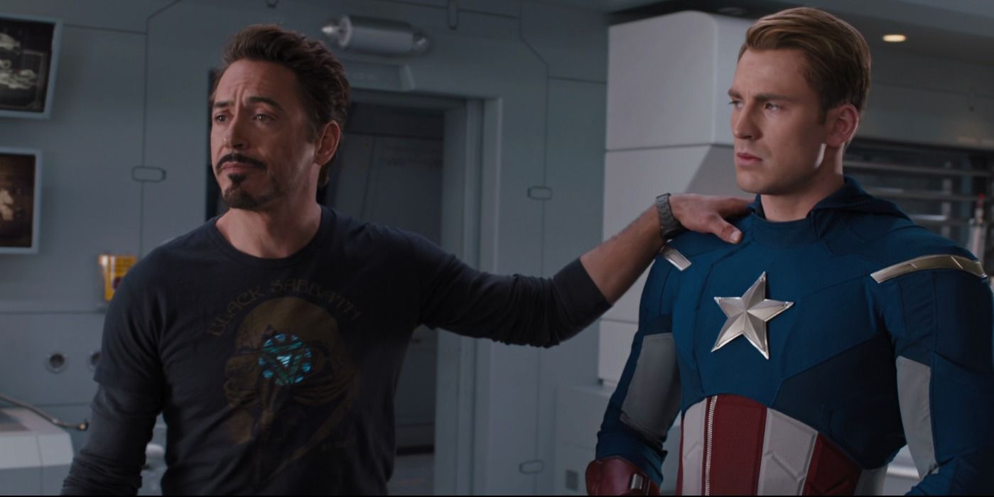 Tony with his hand on Steve's shoulder