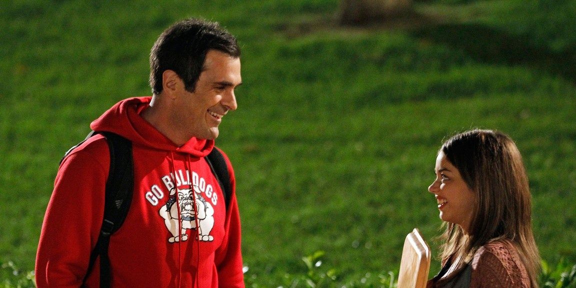 Phil and Haley talking outside at night in Modern Family