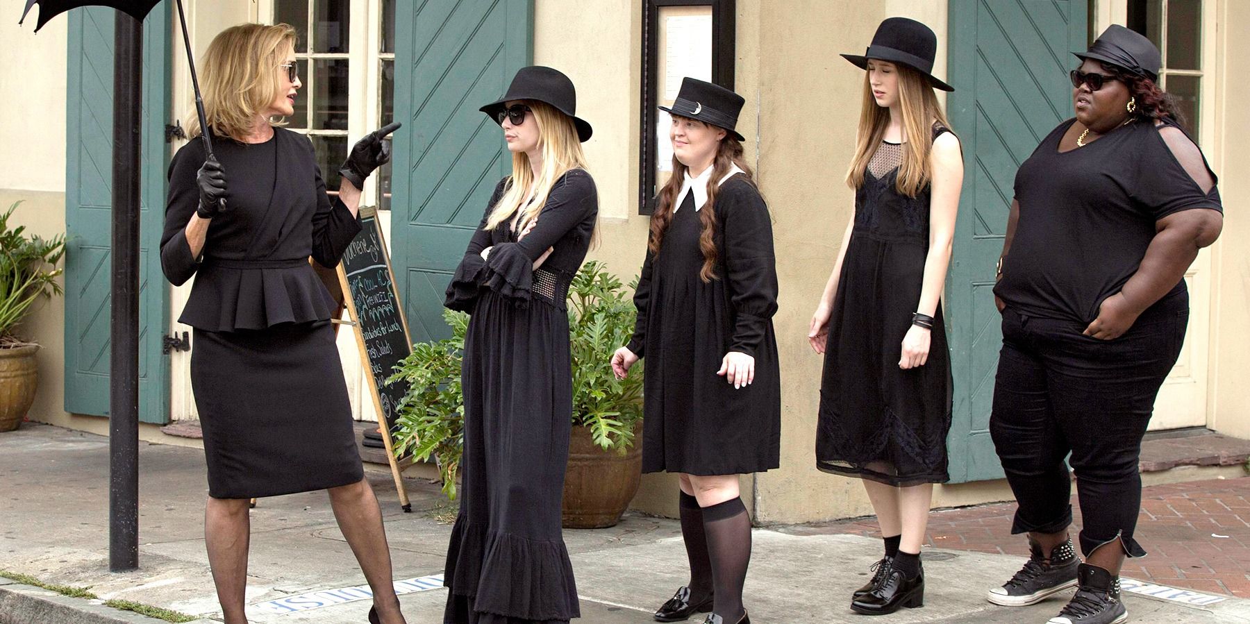 The witch students in black with Fiona in American Horror Story: Coven