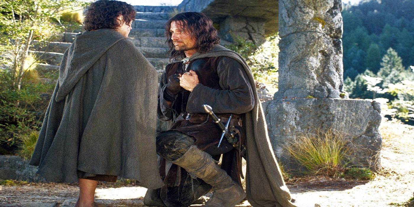 Aragorn kneeling in front of Frodo in The Lord of the Rings. 