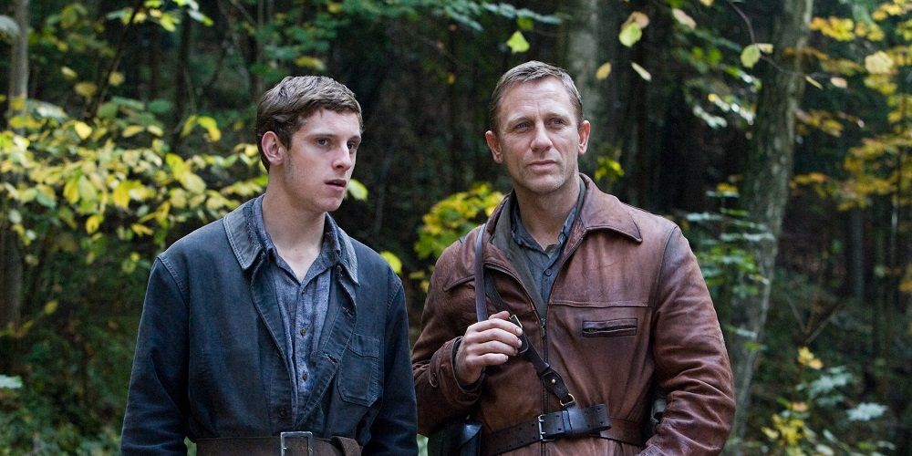 Daniel Craig stands in the woods in Defiance