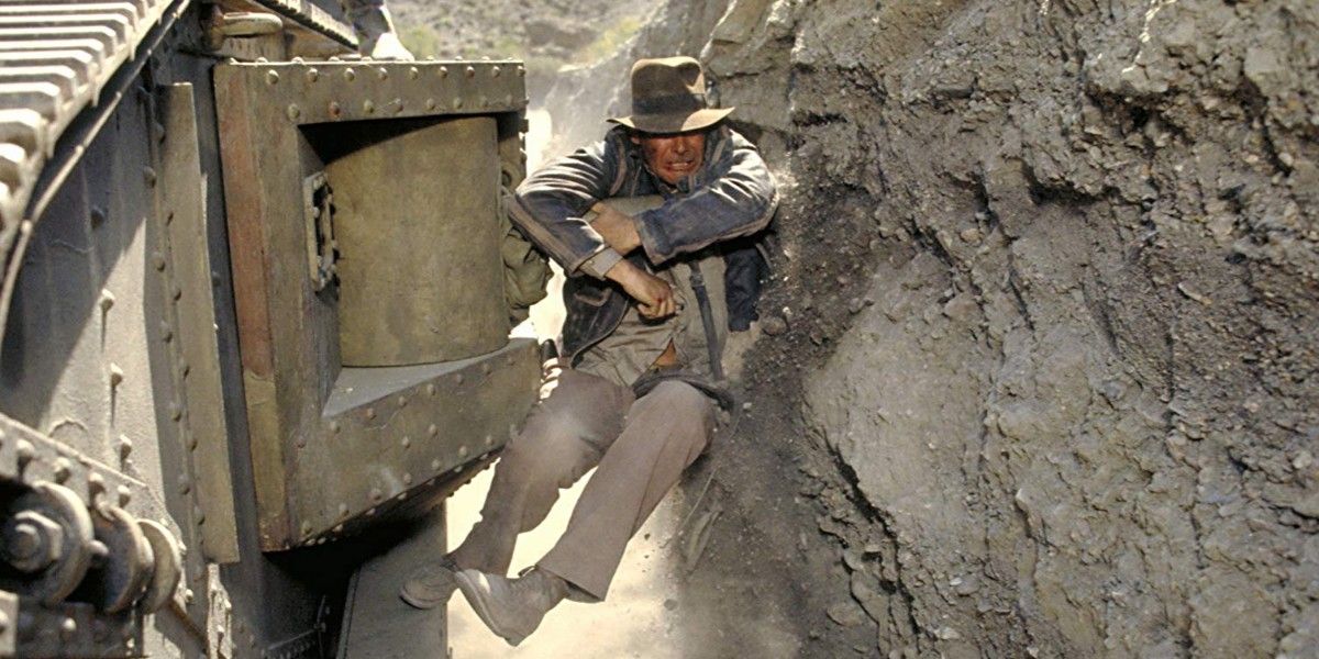 Indy holding on to the side of a tank in Indiana Jones and the Last Crusade.