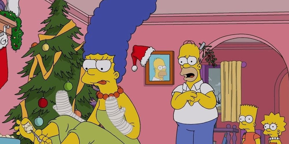 Marge com as mãos enfaixadas no Natal em Os Simpsons