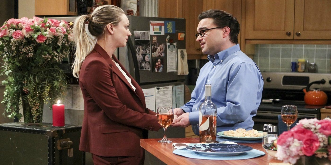Leonard and Penny about to kiss in the kitchen on TBBT