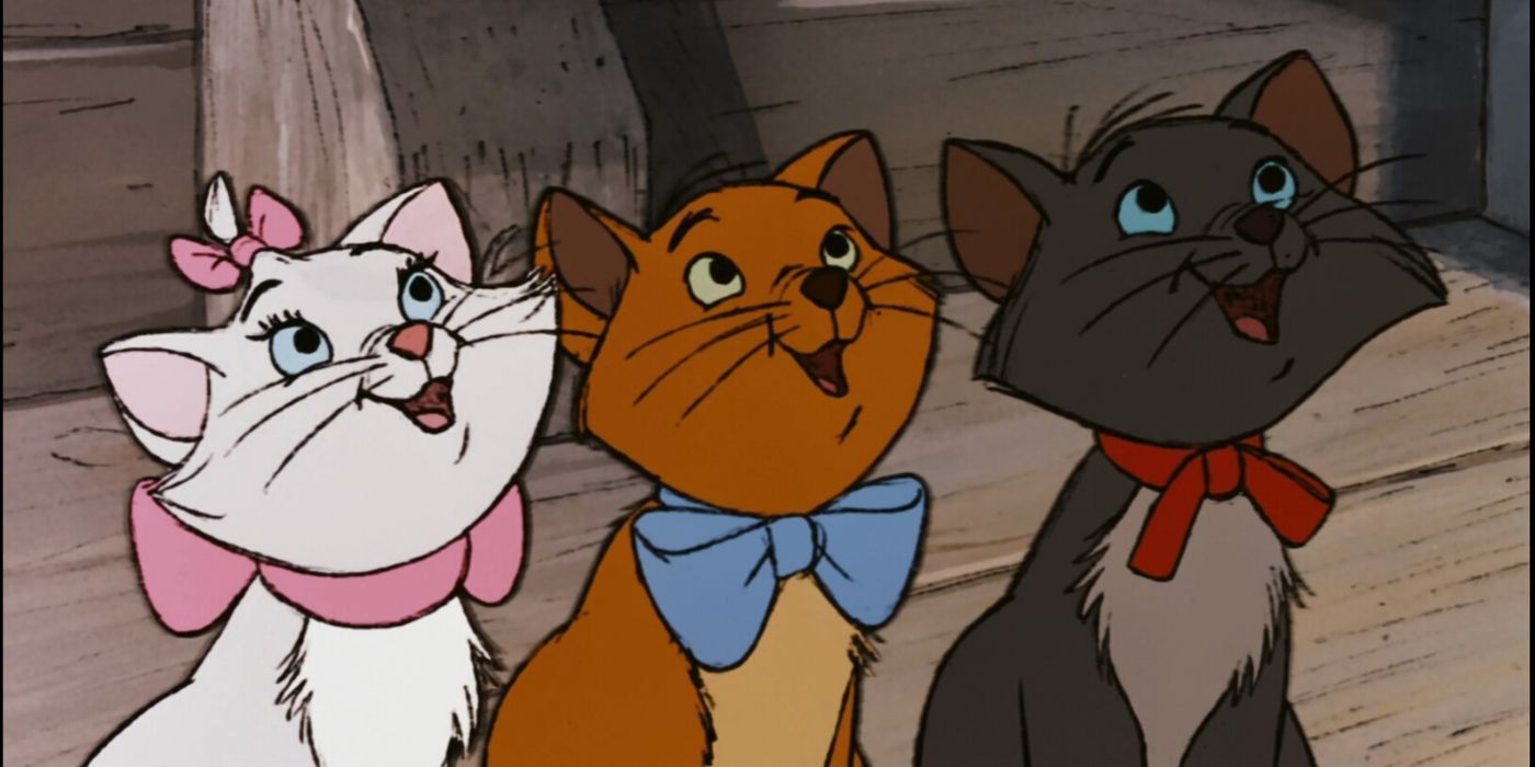 Marie, Tolouse, and Berlioz looking up with hoepful eyes in The Aristocats