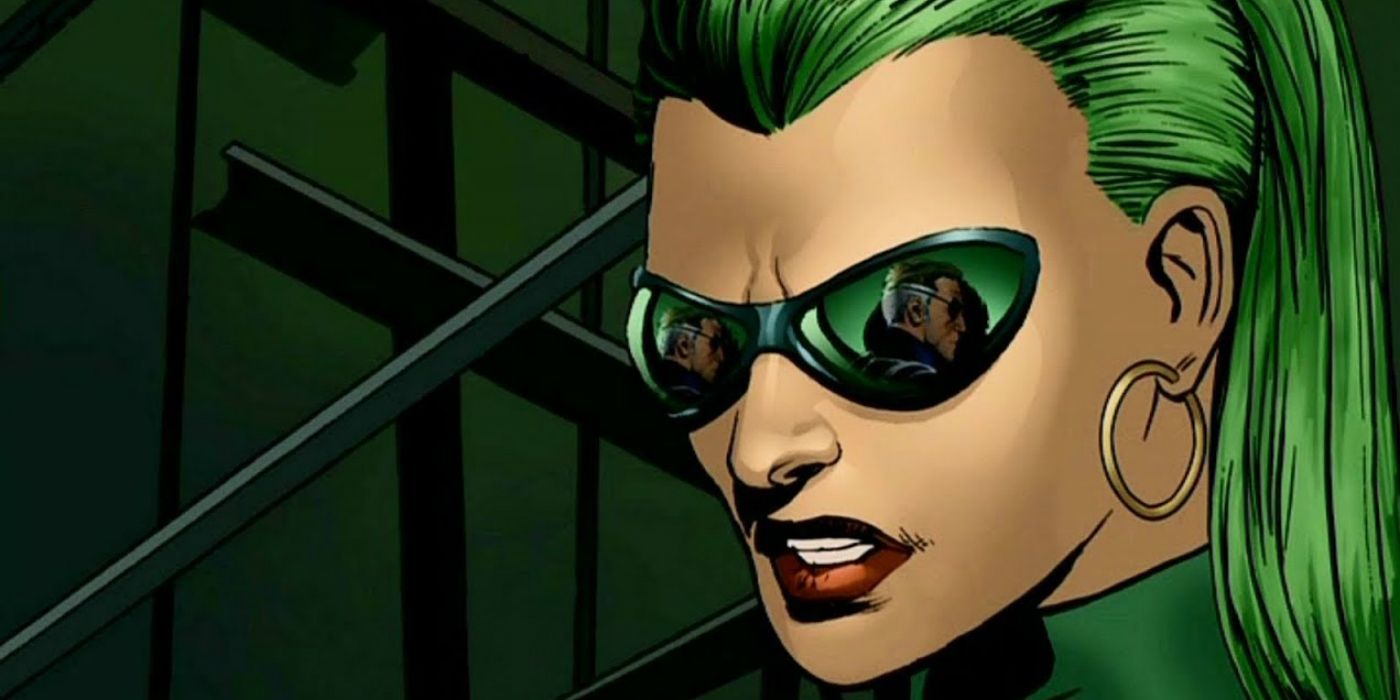 Abigail Brand with a serious look on her face, Nick Fury reflected in her glasses, in Marvel Comics