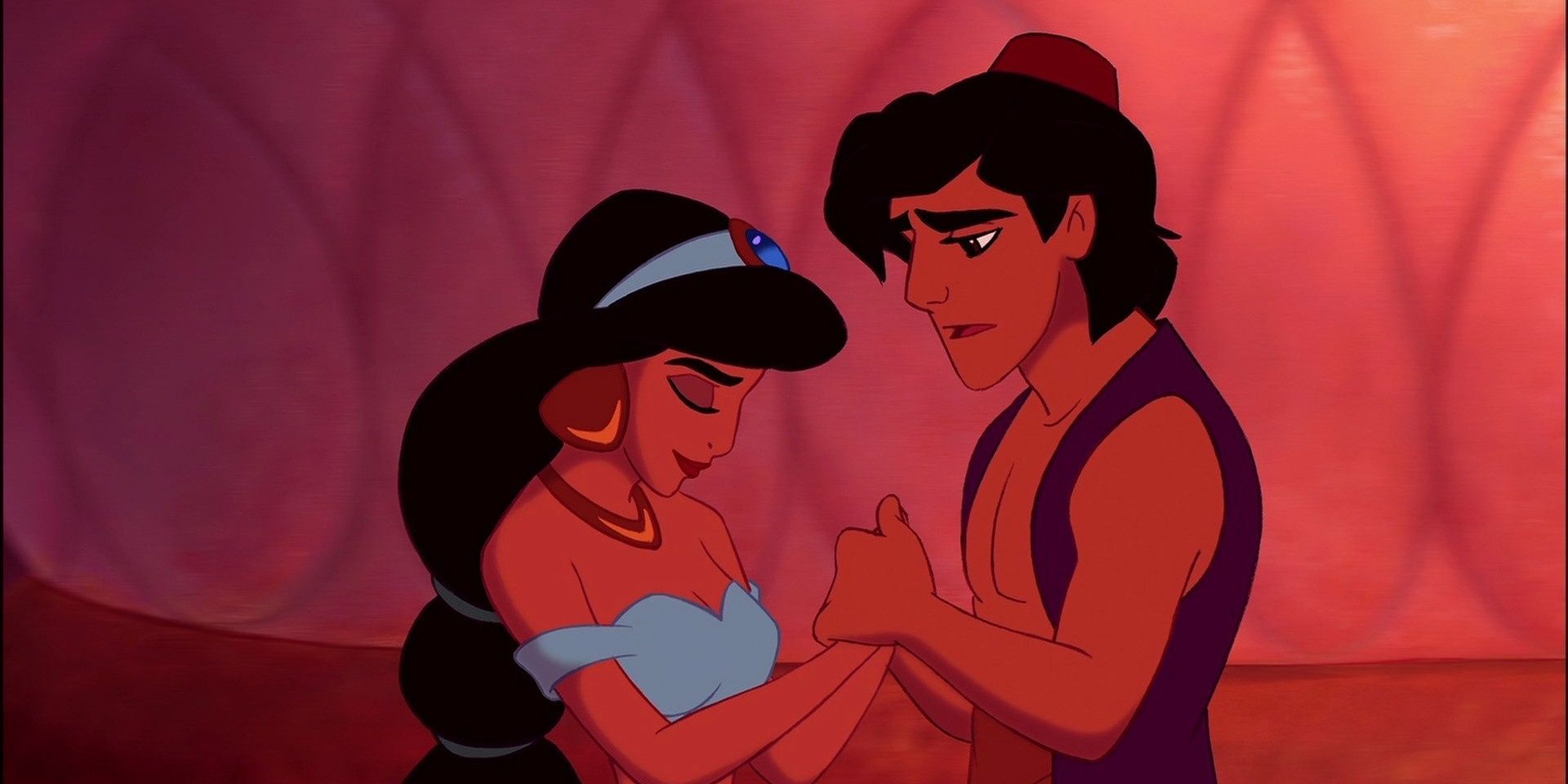 Jasmine and Aladdin hold hands in the animated Aladdin