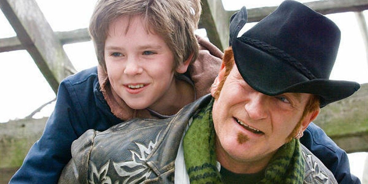 Wizard gives Evan a piggyback ride in August Rush