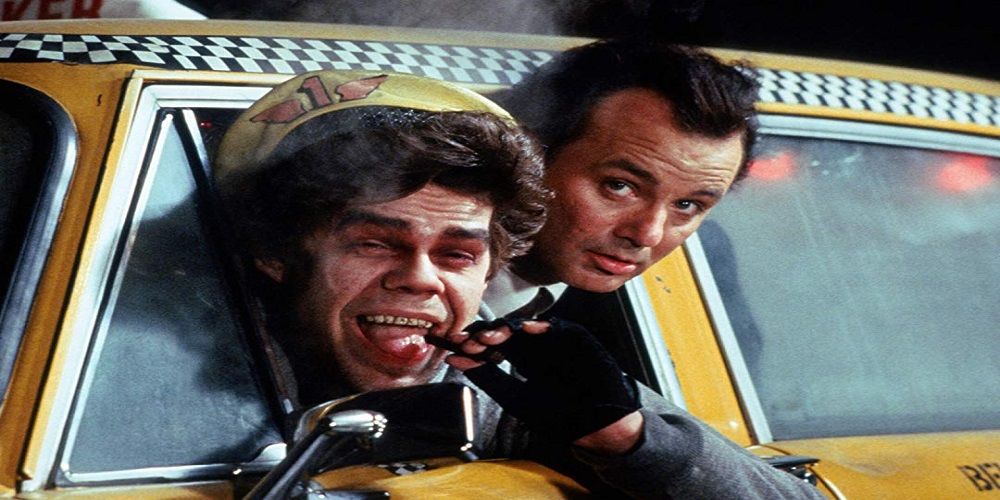 Frank in a taxi with Ghost of Christmas Past in Scrooged