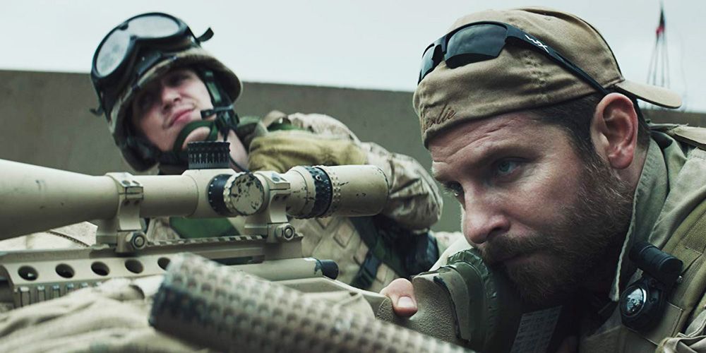 Bradley Cooper looking through a sniper lens in American Sniper
