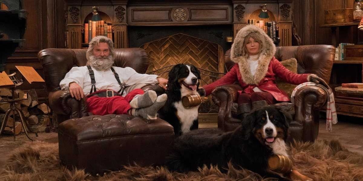 Santa Claus and his wife sit in chairs in The Christmas Chronicles