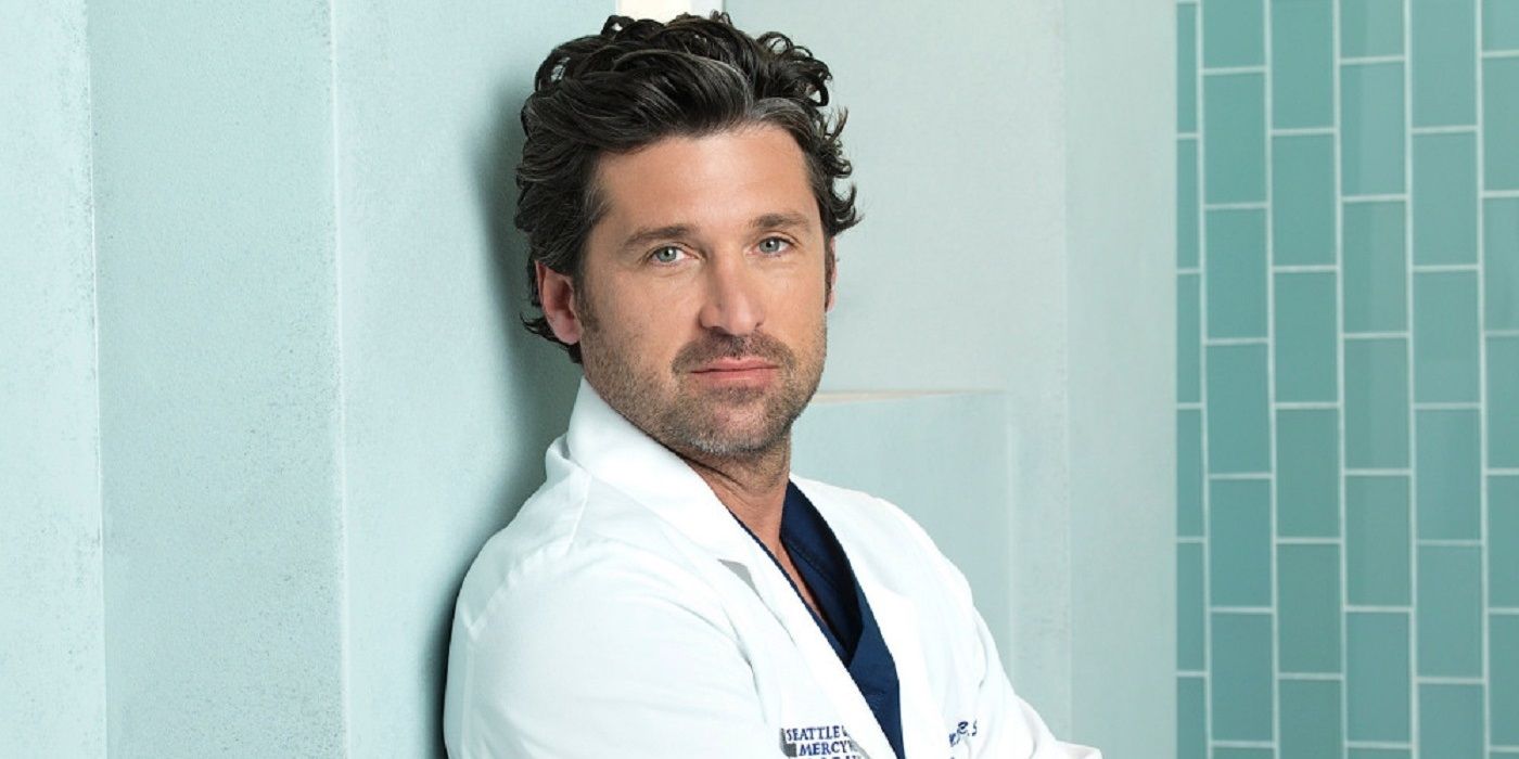 Derek leaning against a wall in Grey's Anatomy