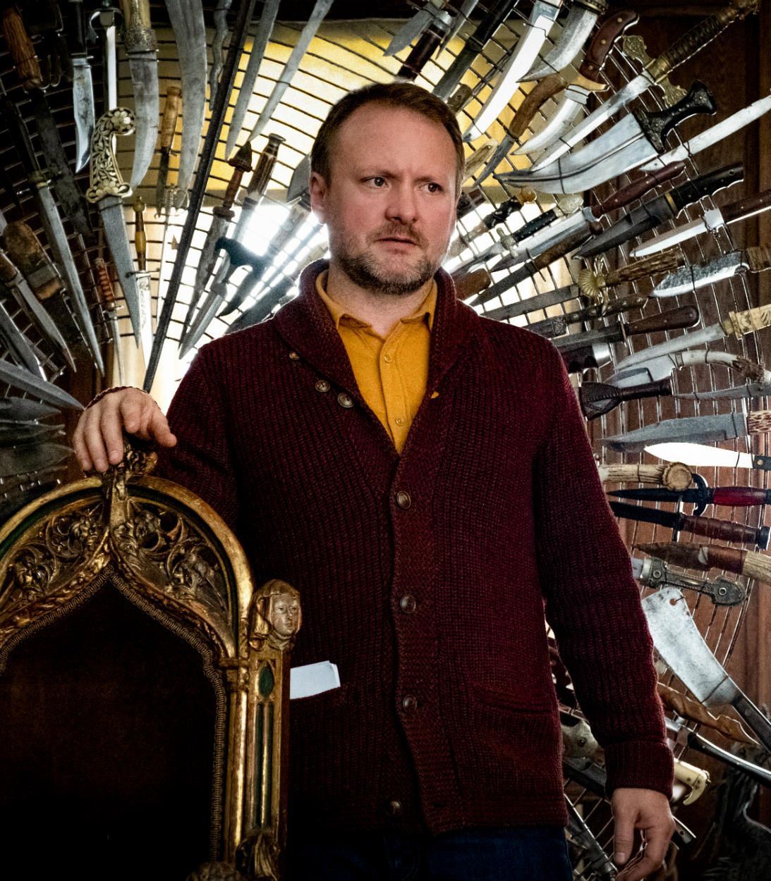 Director Rian Johnson on the set of Knives Out