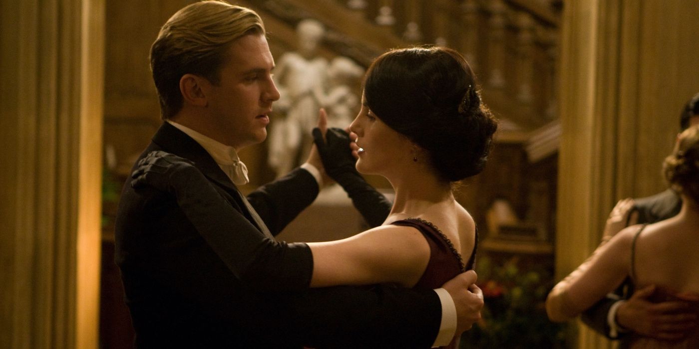 Two characters dancing in "Christmas at Downton Abbey"