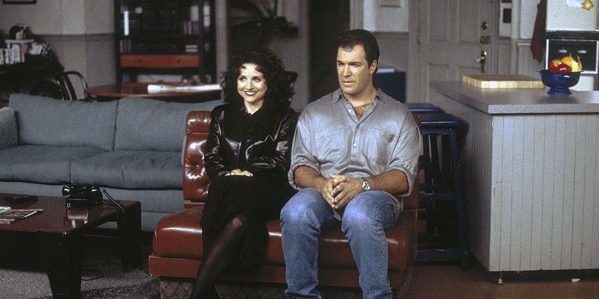 Elaine and Puddy sitting together on Seinfeld