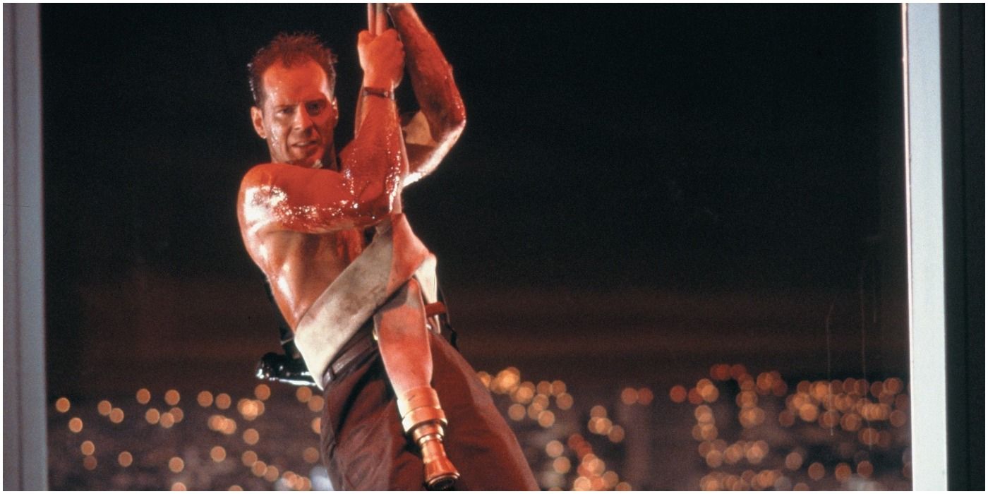 John McClane hanging outside a window in Die Hard