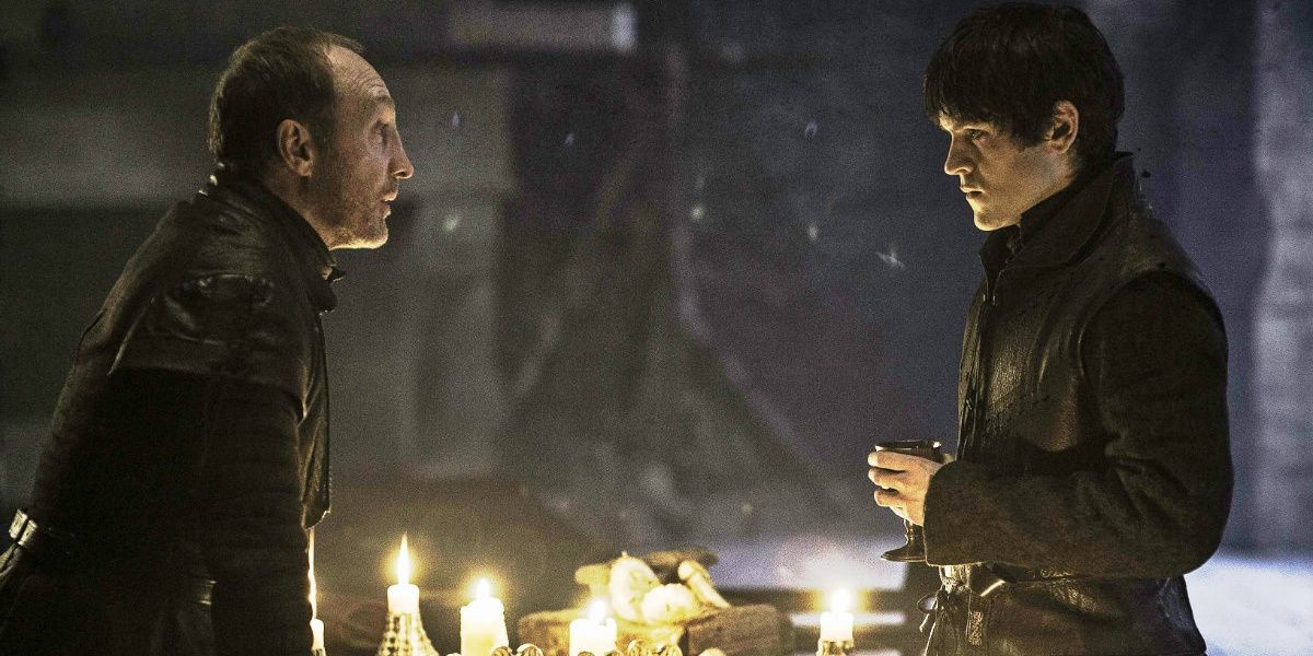 Ramsay and Roose Bolton talk over a table in Game of Thrones