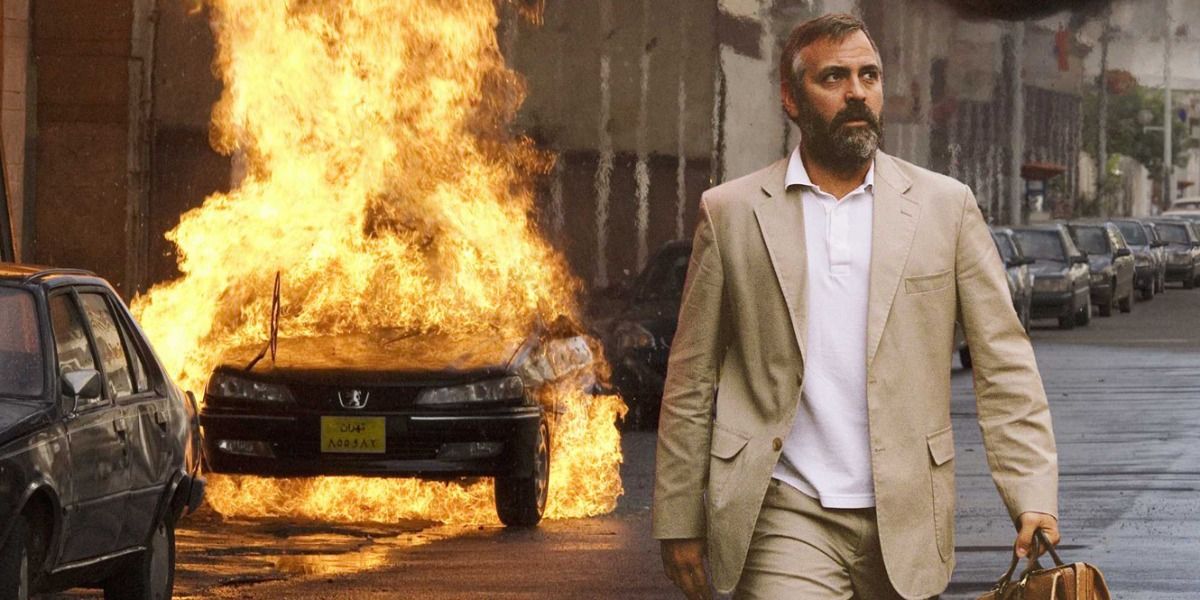 George Clooney walking away from an explosion in Syriana (2005)