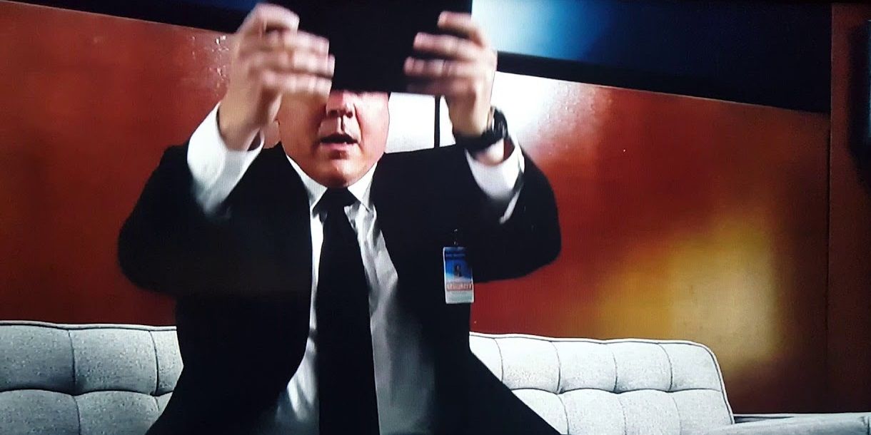 Happy Hogan struggling with his tablet in Iron Man 3