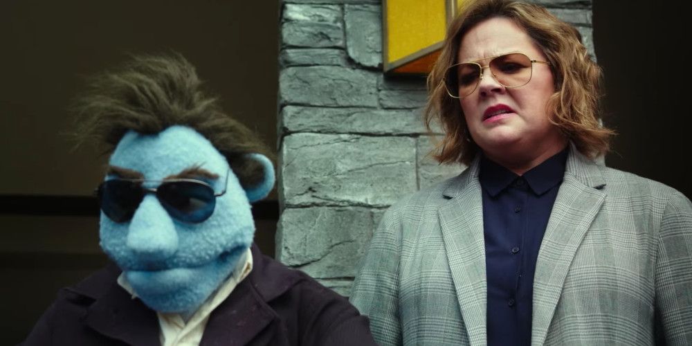 Melissa McCarthy and a muppet detective in the Happytime Murders