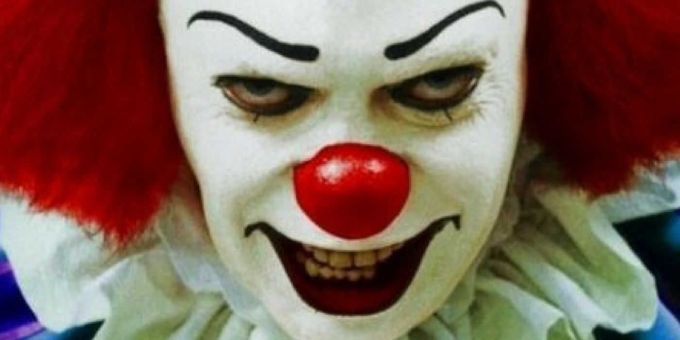 Tim Curry as the original Pennywise in the It miniseries