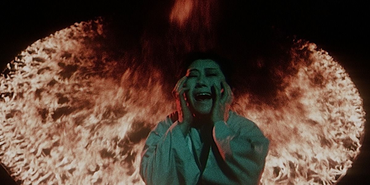 A woman screams in Hell from Jigoku 