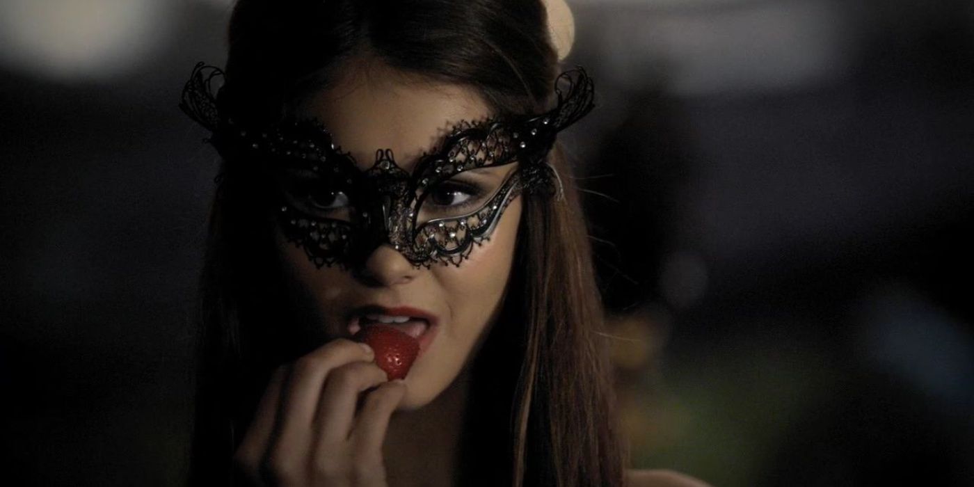 Katherine Pierce eating a stawberry in The Vampire Diaries.
