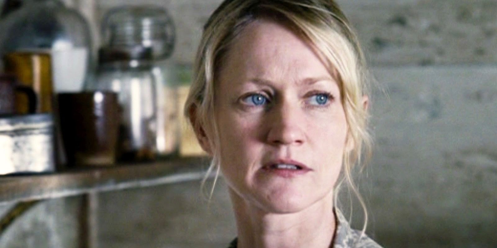 Katniss' mom looking stoic in the Hunger Games