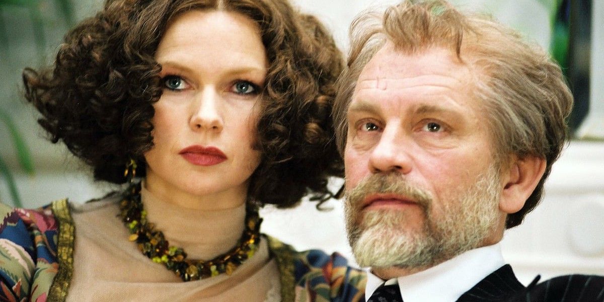 John Malkovich looking intently in a scene from Klimt