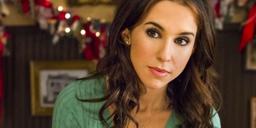 Lacey Chabert smiling in a Hallmark Christmas Movie