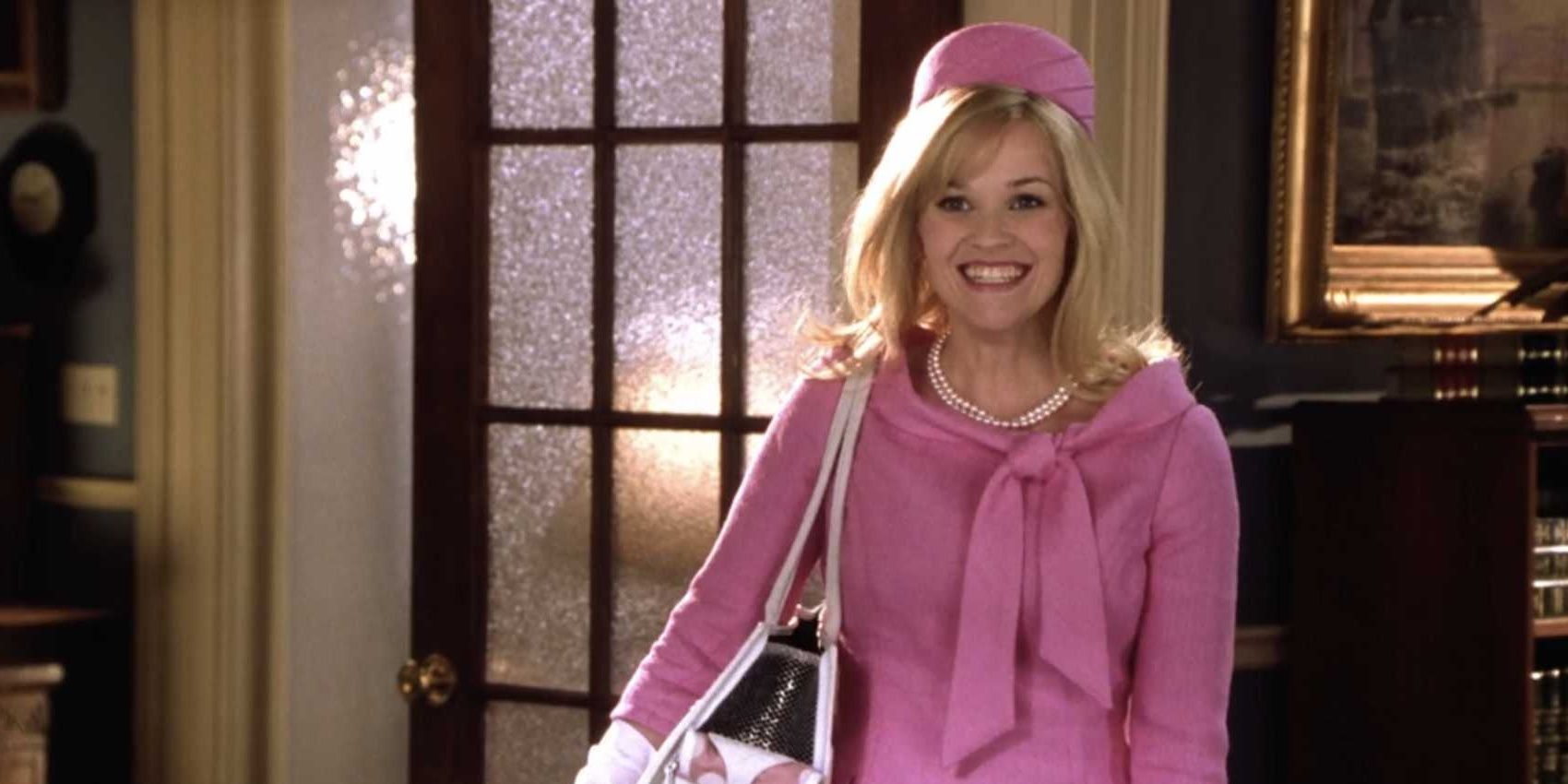 Elle Woods in an all-pink outfit smiling in Legally Blonde 2