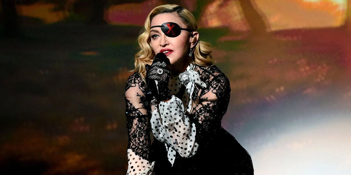 Madonna in a lace dress and eye patch