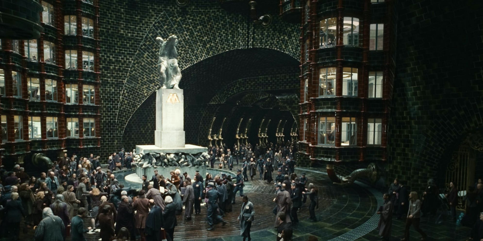 A wide shot of the Ministry of Magic in Harry Potter, busy with employees.